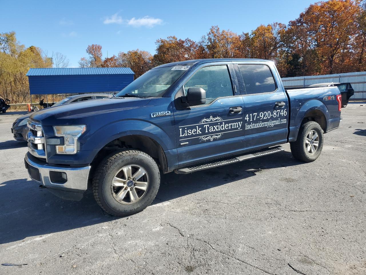2015 Ford F-150 XLT, VIN 1FTEW1EP9FKE40022 — Side