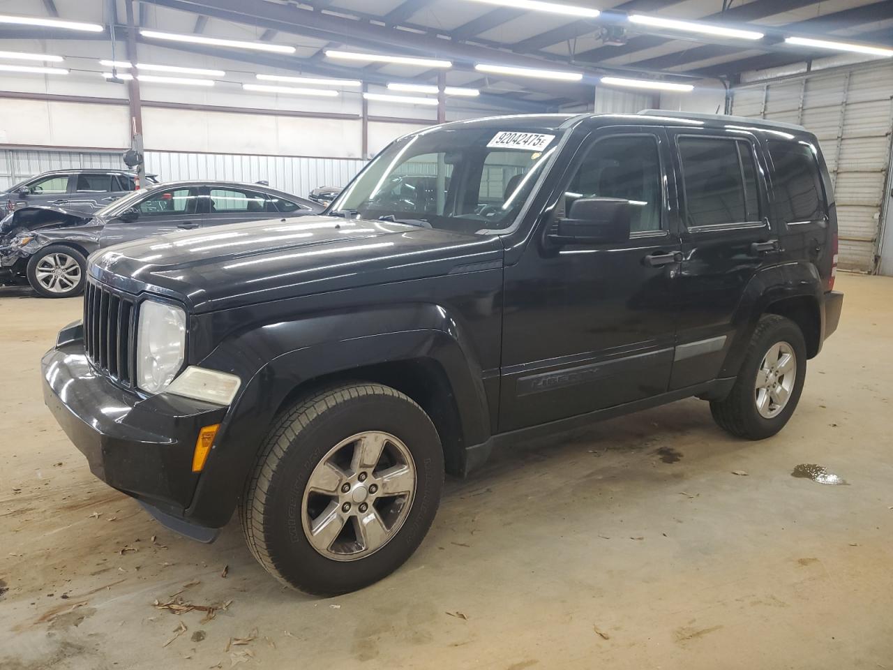 2012 Jeep Liberty Sport, VIN 1C4PJLAK7CW103737 — Бок