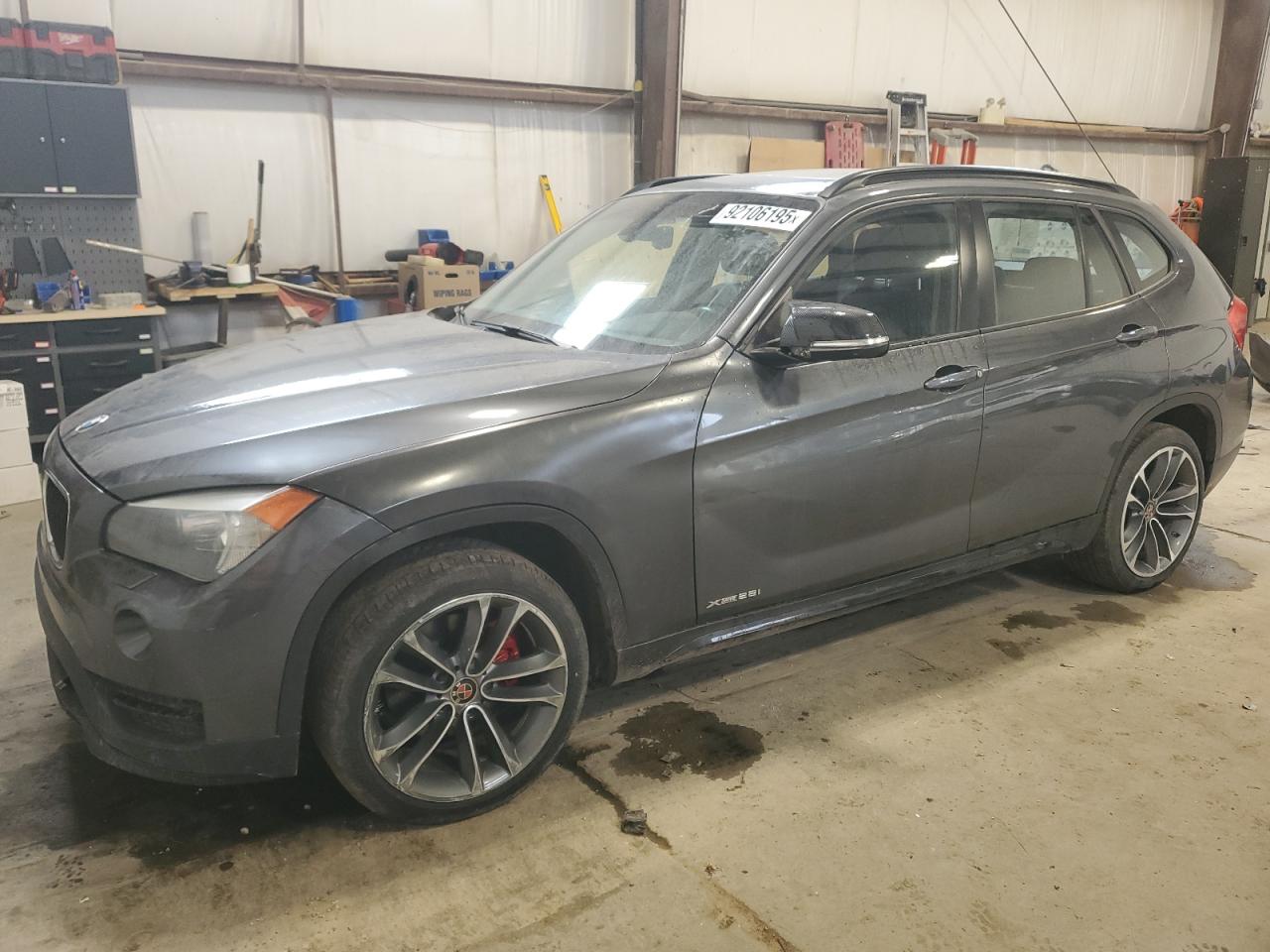 2015 BMW X1 xDrive28i, VIN WBAVL1C59FVY36358 — Auction photo