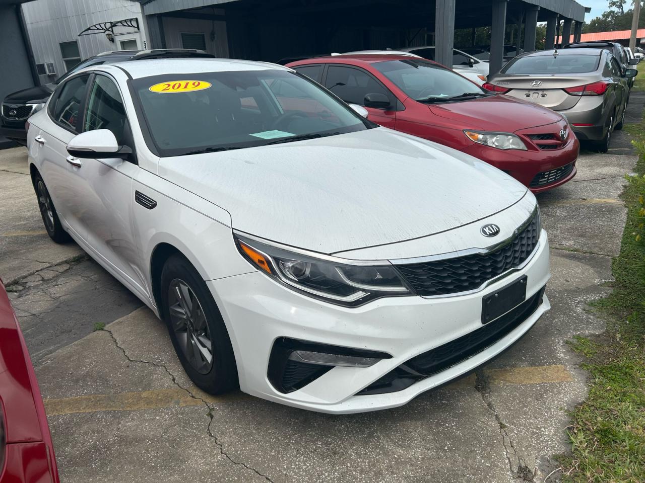 2019 Kia Optima S, VIN 5XXGT4L35KG358523 — Prior damage history