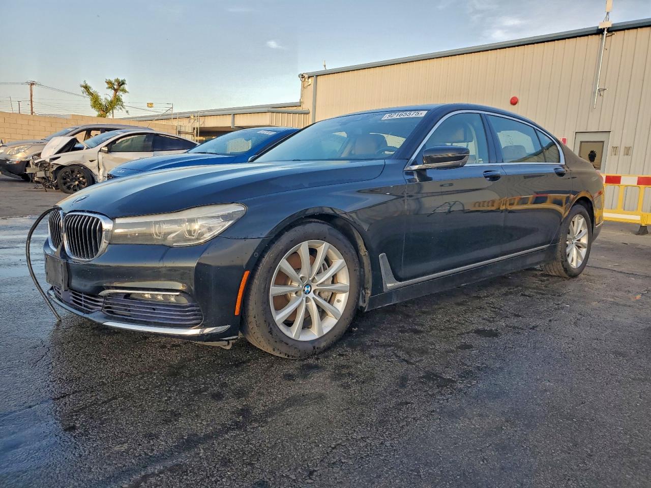 2016 BMW 7 Series 740i, VIN WBA7E2C50GG547545 — Minor dents and scratches