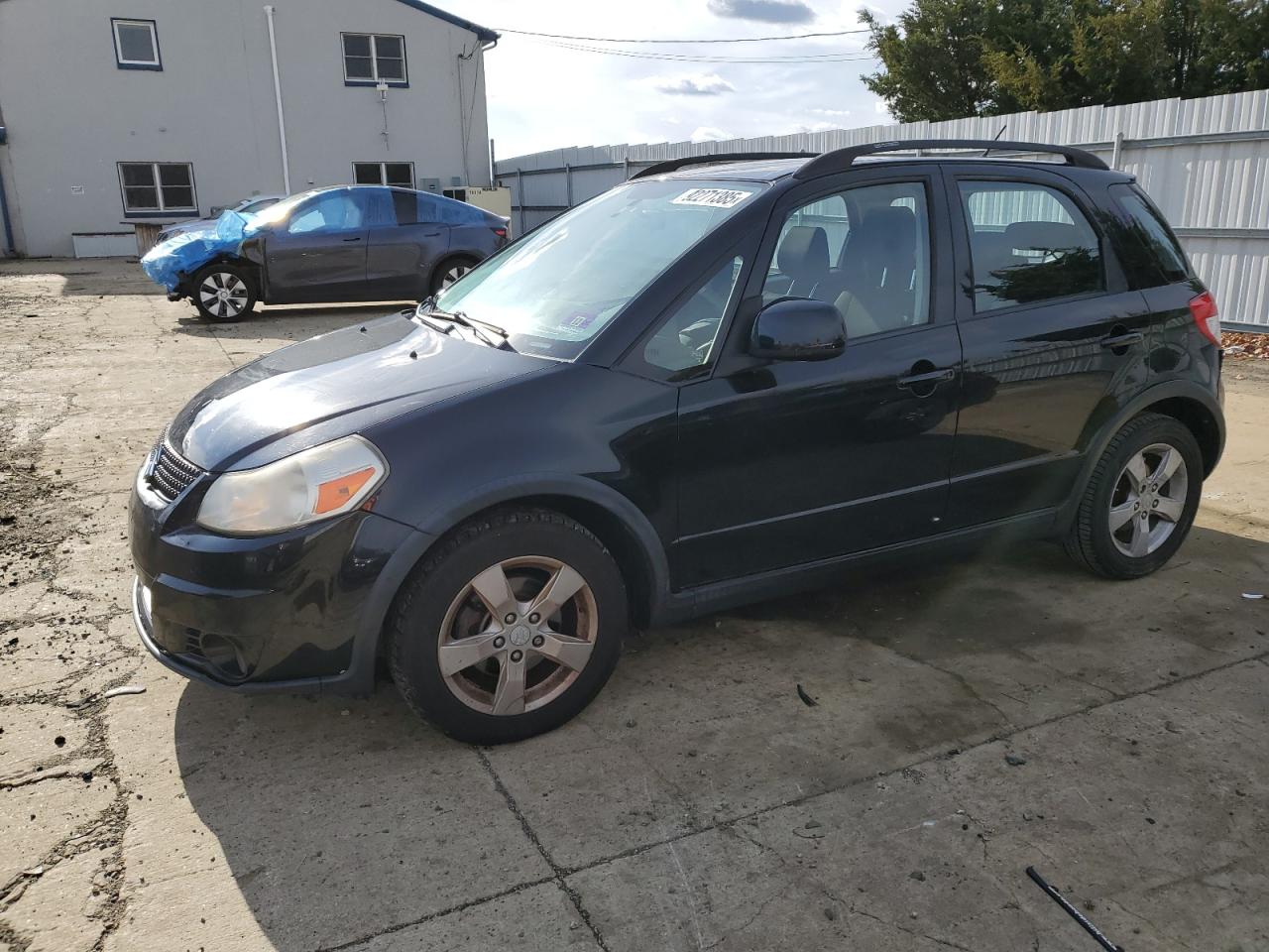 2012 Suzuki SX4 Crossover, VIN JS2YB5A39C6307709 — Rear end