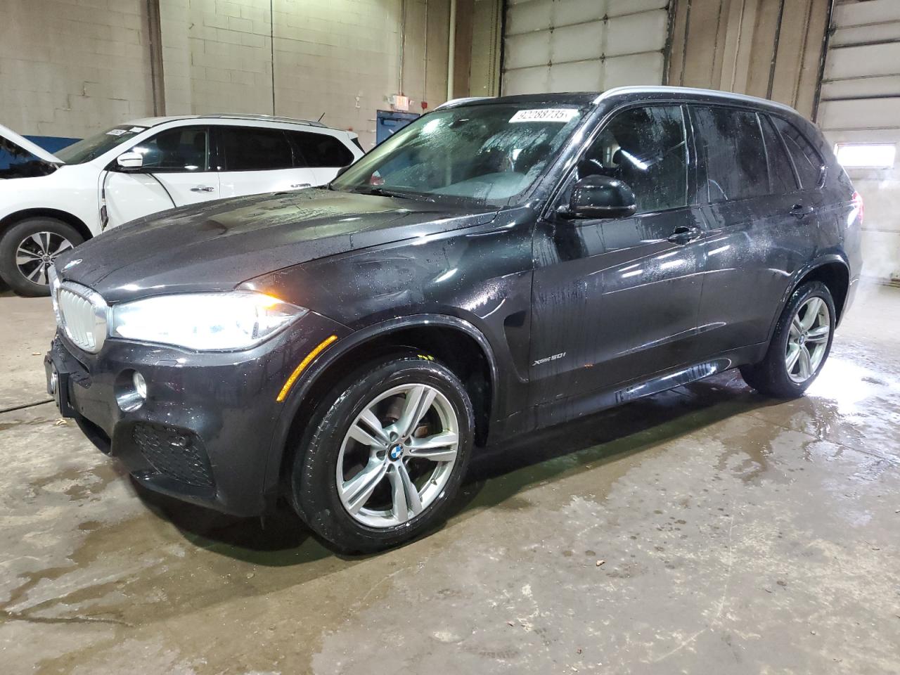 2015 BMW X5 xDrive50i, VIN 5UXKR6C52F0J78718 — Minor dents and scratches