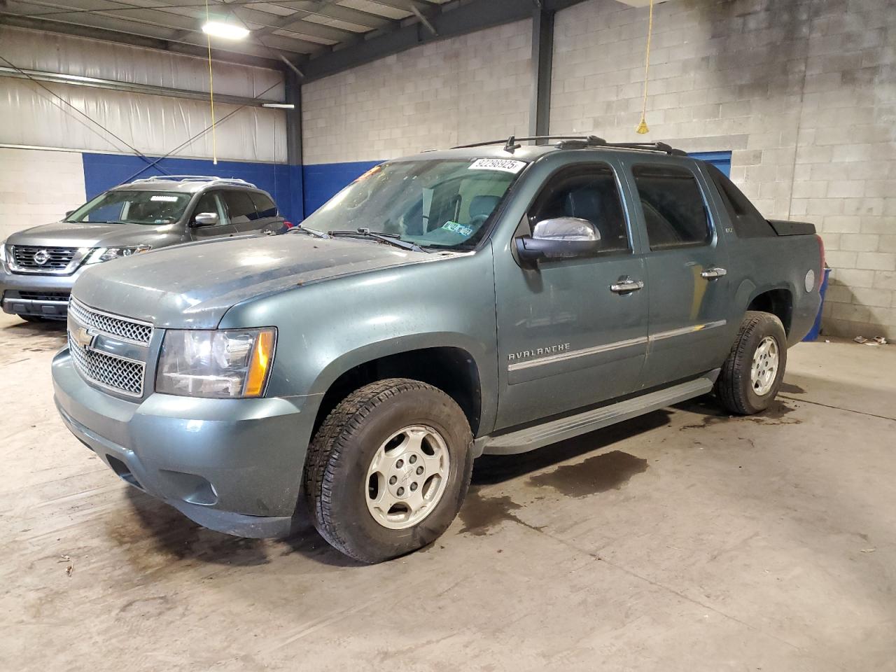 2011 Chevrolet Avalanche LTZ, VIN 3GNTKGE33BG126202 — Vandalism