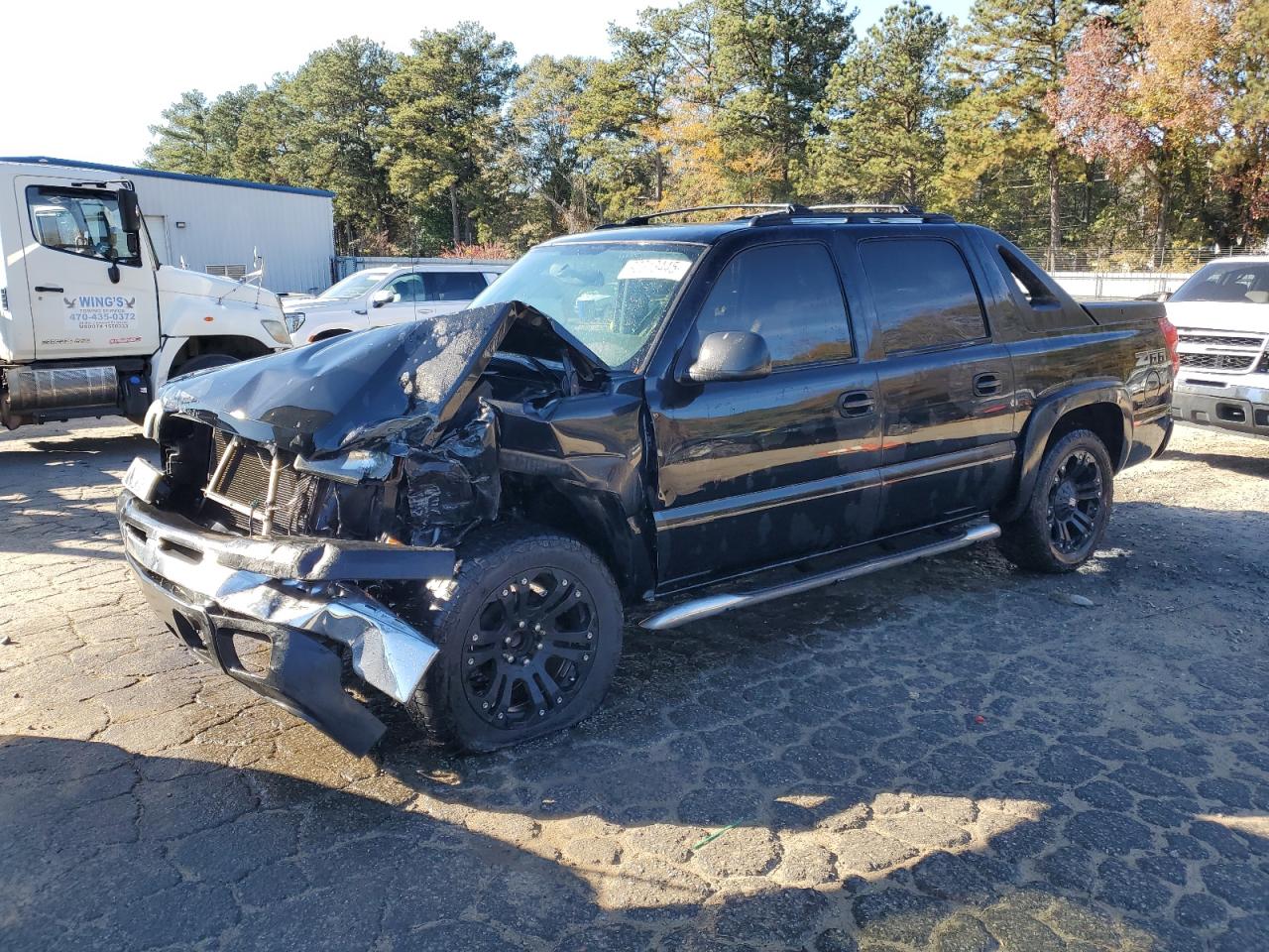 2004 Chevrolet Avalanche Z66, VIN 3GNEC12T34G109636 — Front end