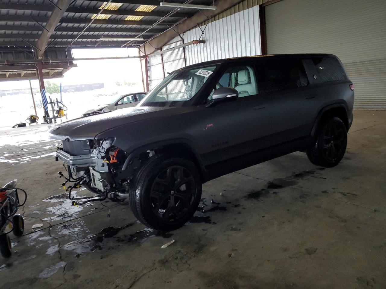 2026 Rivian R1S, VIN 7PDSGCBA8TN079297 — Front end