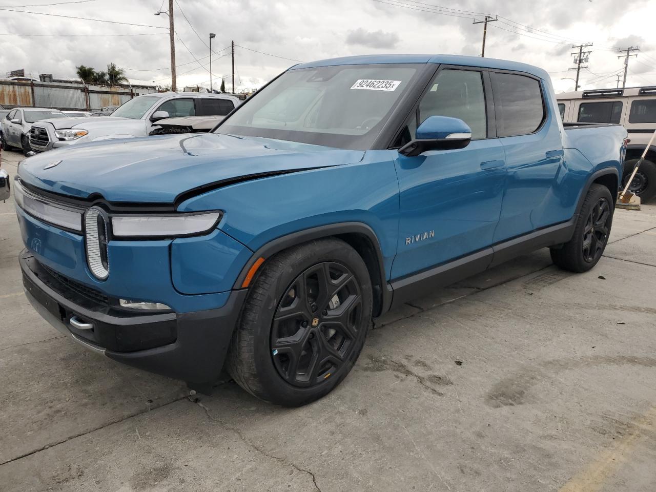 2024 Rivian R1T Adventure, VIN 7FCTGCAA3RN030878 — Front end