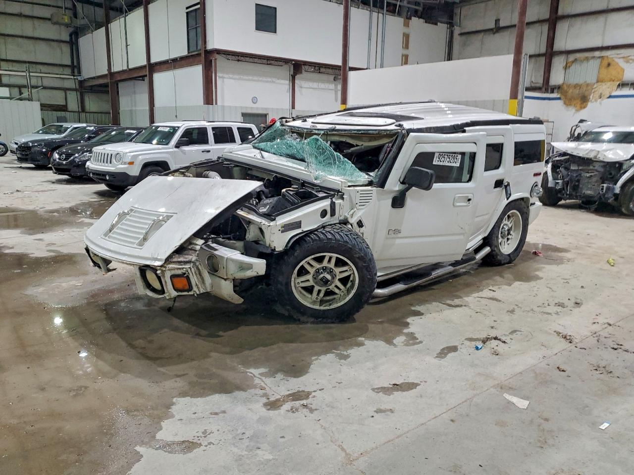 2003 Hummer H2, VIN 5GRGN23U93H125898 — Rollover