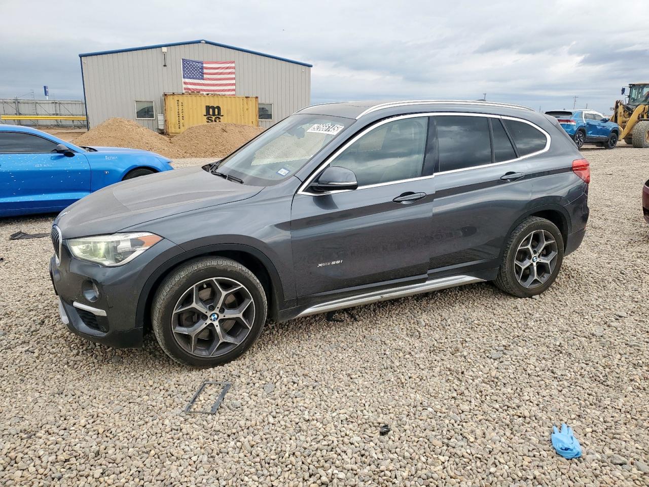 2018 BMW X1 xDrive28i, VIN WBXHT3C30J5K24314 — Hail