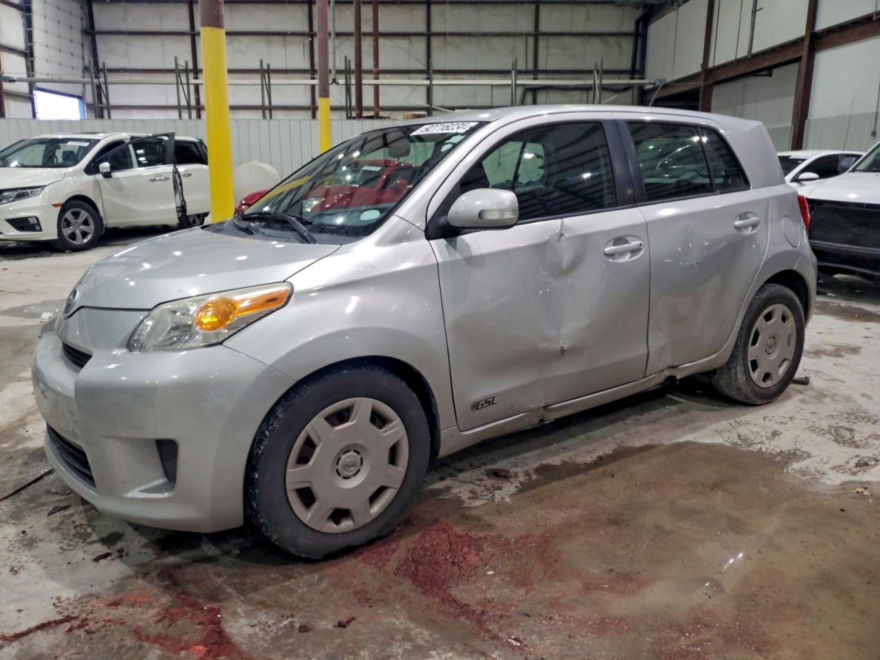 2010 Scion xD, VIN JTKKU4B40A1001528 — Side