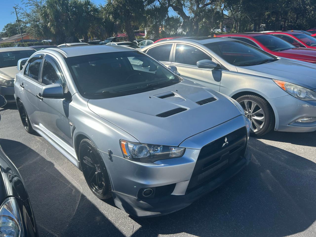 2012 Mitsubishi Lancer Evolution GSR, VIN JA32W8FV0CU025887 — Prior damage history