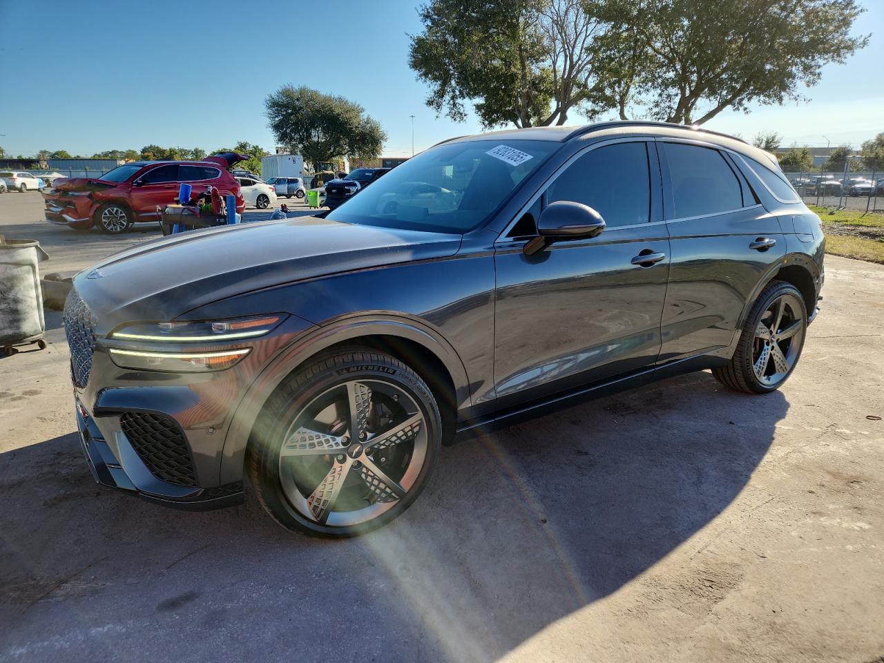 2022 Genesis GV70 Sport, VIN KMUMCDTC3NU042620 — Rear end