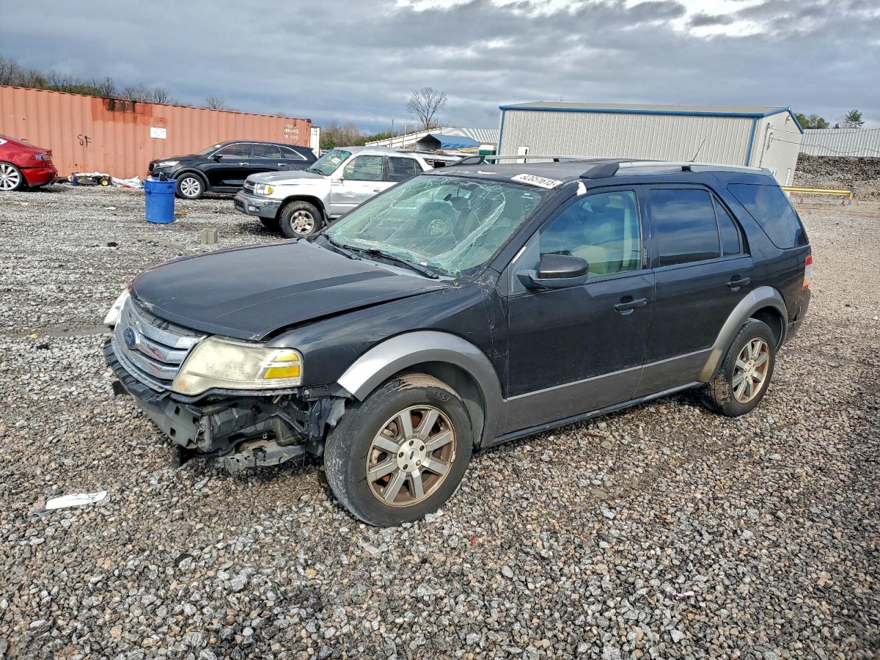 2009 Ford Taurus X SEL, VIN 1FMDK02W29GA03382 — Front end