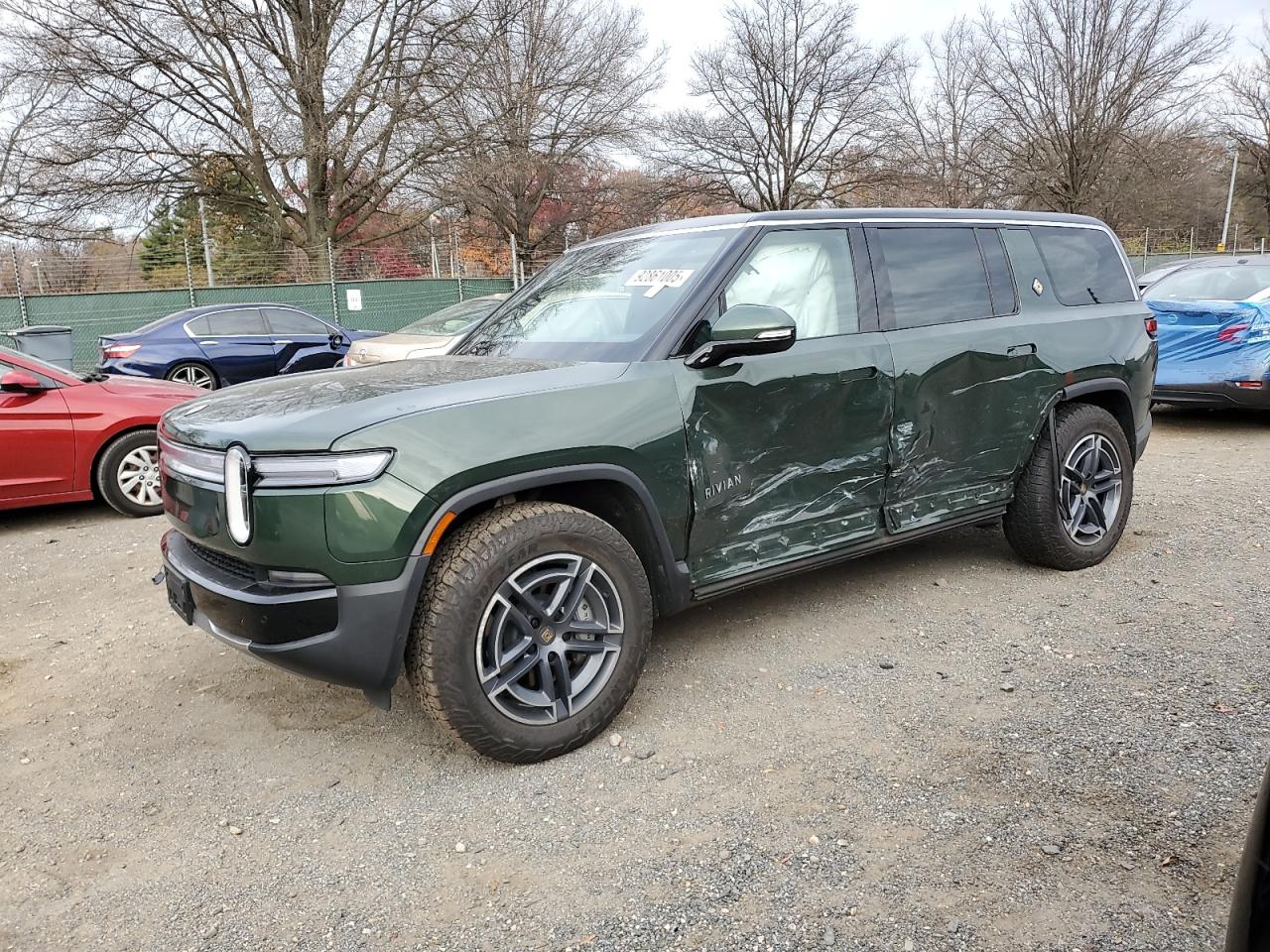 2025 Rivian R1S Adventure, VIN 7PDSGBBA7SN048065 — Бок