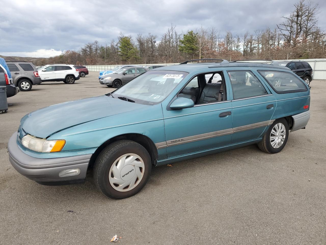 1992 Ford Taurus, VIN 1FACP57U0NA163978 — Rear end
