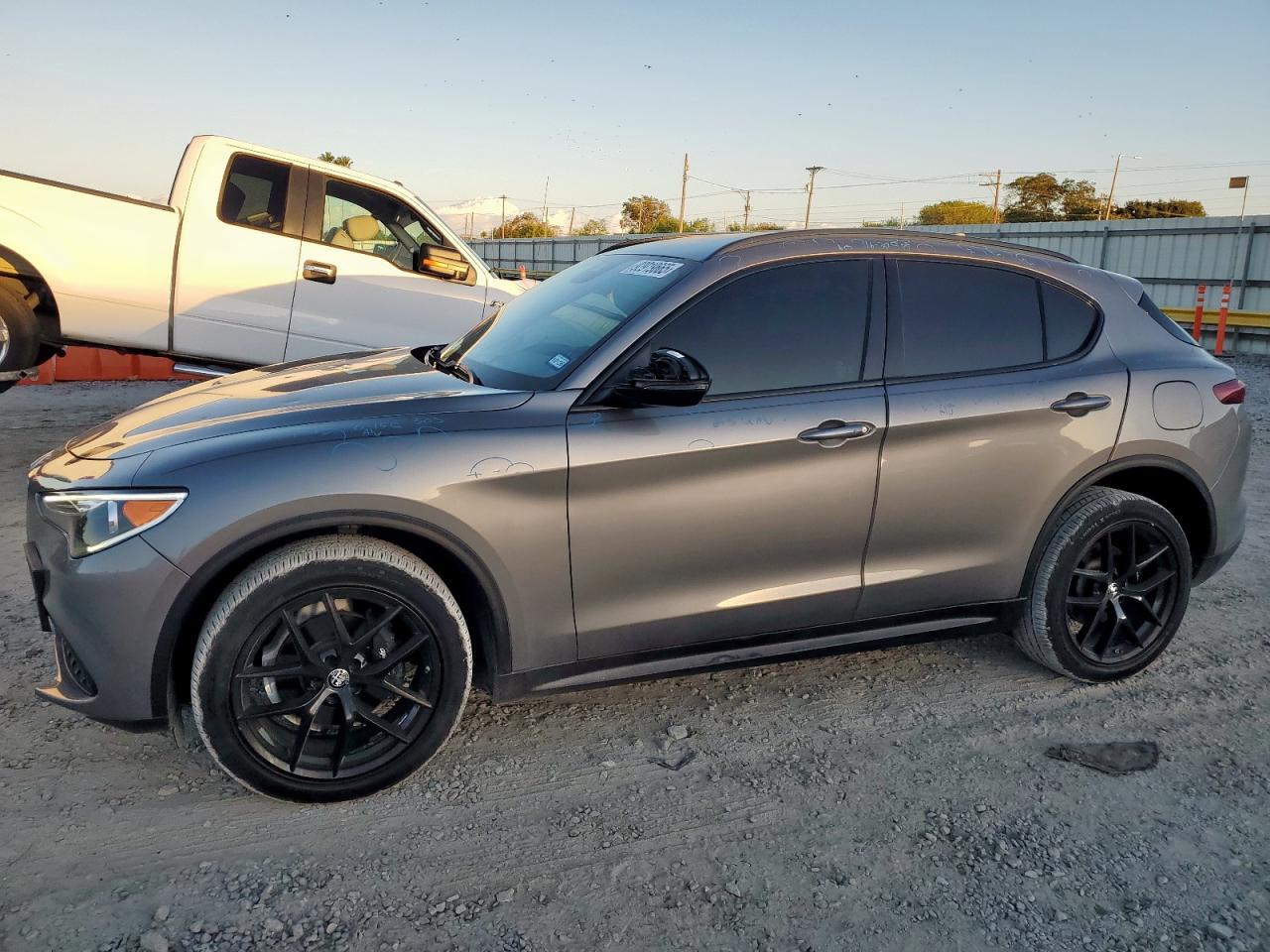 2019 Alfa Romeo Stelvio Ti Sport, VIN ZASPAKBN8K7C44884 — Hail