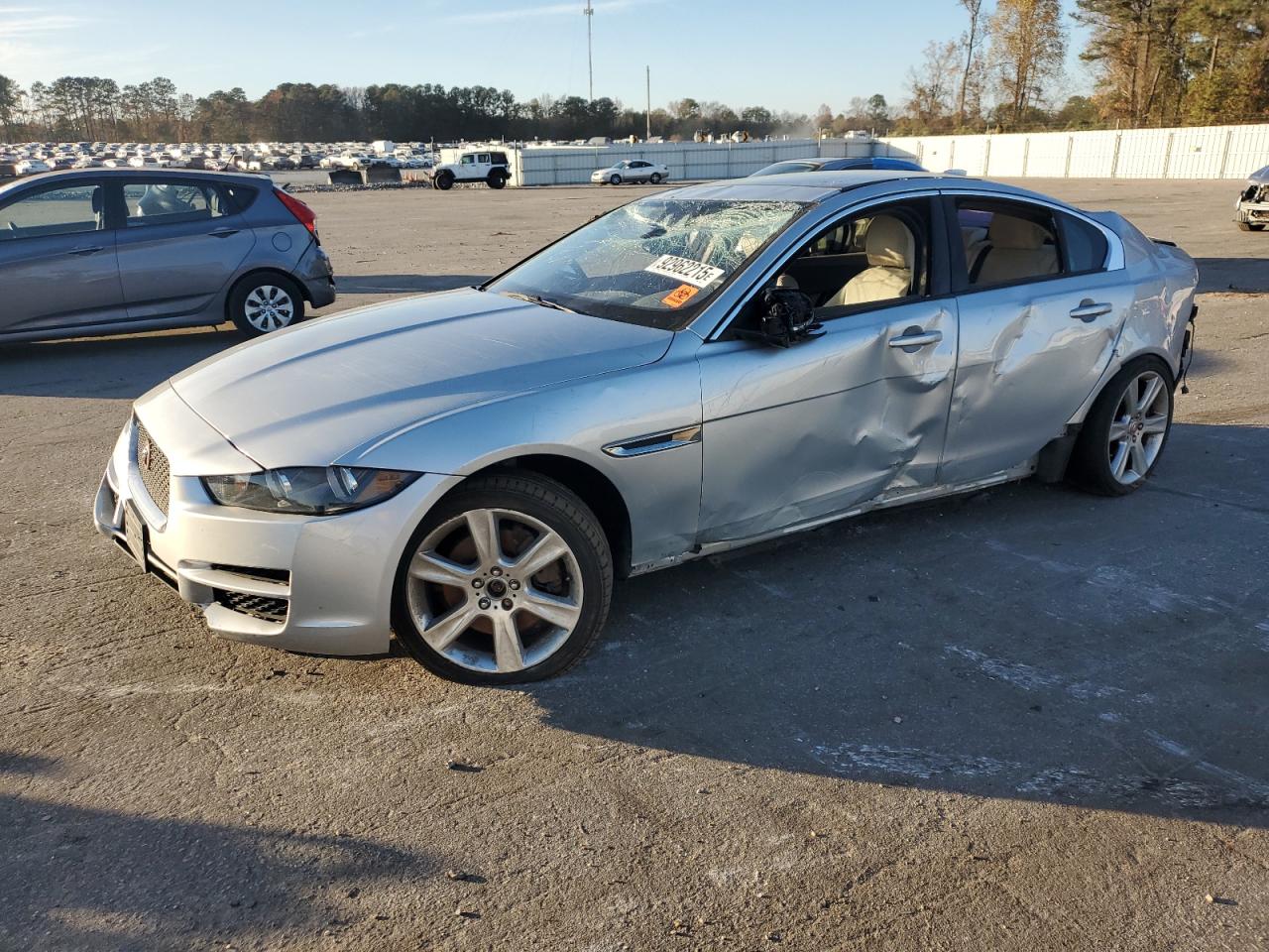 2018 Jaguar XE 25t Premium, VIN SAJAJ4FX4JCP21694 — Side