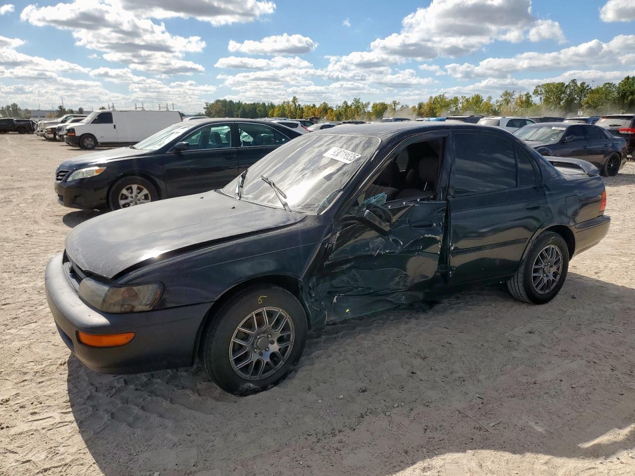 1995 Toyota Corolla, VIN 1NXAE04B4SZ283740 — Side