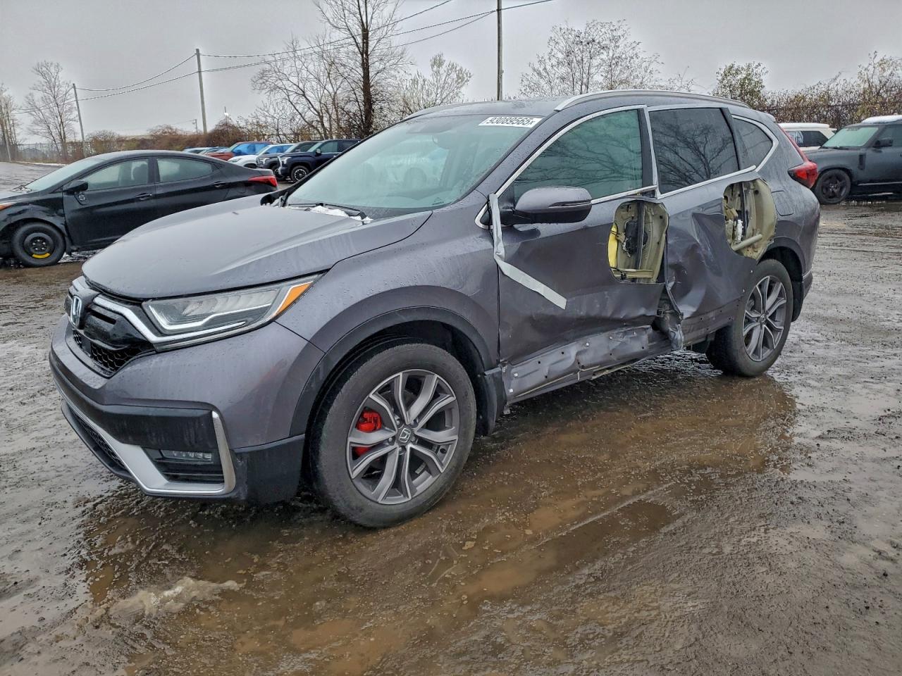 2020 Honda CR-V Touring, VIN 2HKRW2H91LH222414 — Side