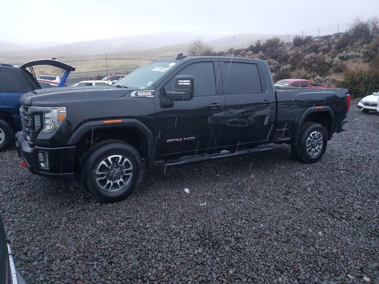2021 GMC Sierra 2500HD AT4, VIN 1GT19PEY3MF298399 — Minor dents and scratches