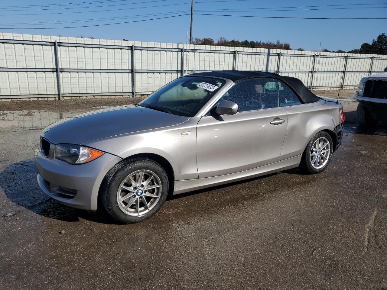 2011 BMW 1 Series 128i, VIN WBAUL7C53BVE87192 — Rear end