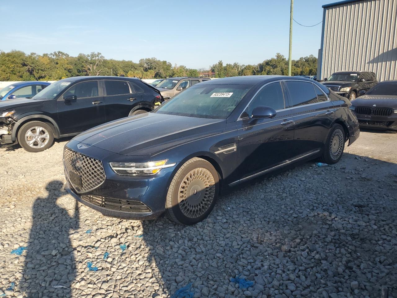 2020 Genesis G90 Premium, VIN KMTF34PA8LU076409 — Зад