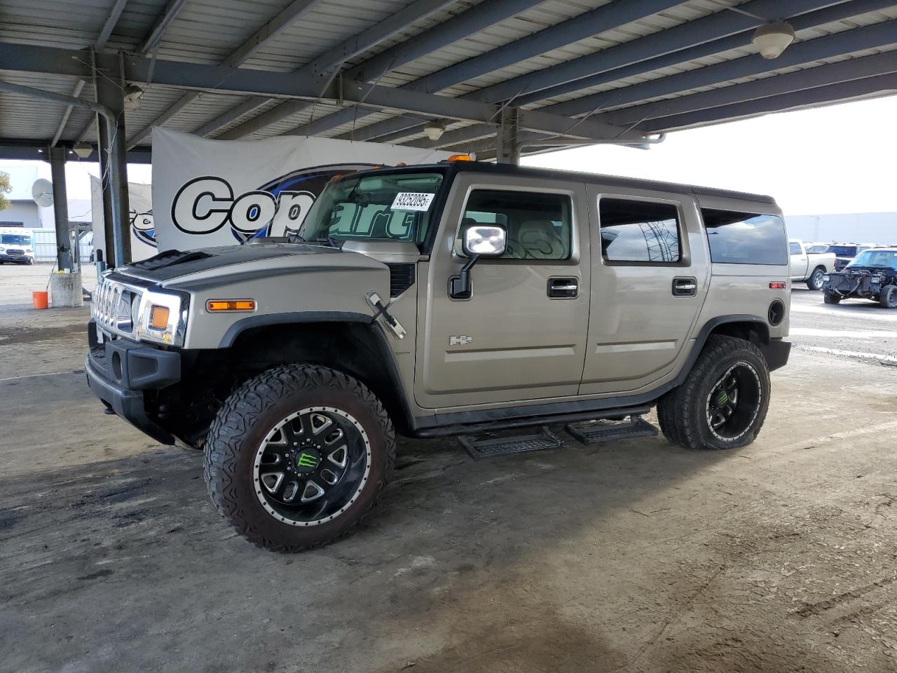 2003 Hummer H2, VIN 5GRGN23U93H105571 — Undercarriage