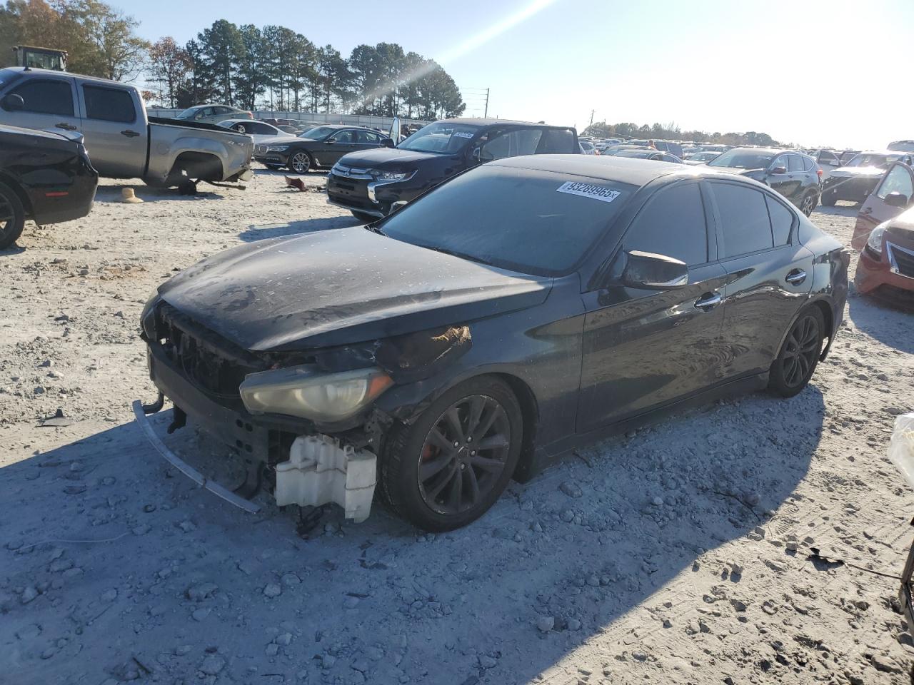 2014 Infiniti Q50 Premium, VIN JN1BV7ARXEM694179 — Engine fire
