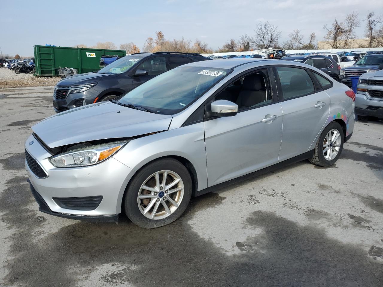 2015 Ford Focus SE, VIN 1FADP3F28FL383982 — Side