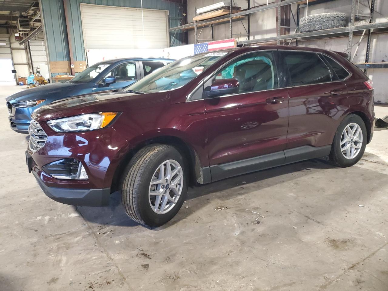 2021 Ford Edge SEL, VIN 2FMPK4J97MBA52030 — Side