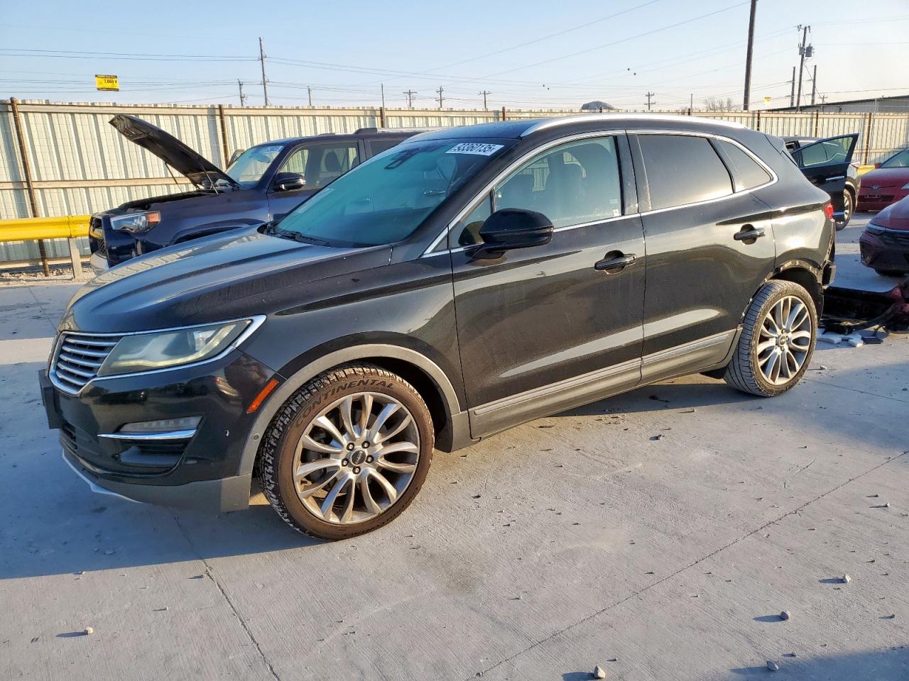 2015 Lincoln MKC, VIN 5LMCJ1A90FUJ27595 — Rear end