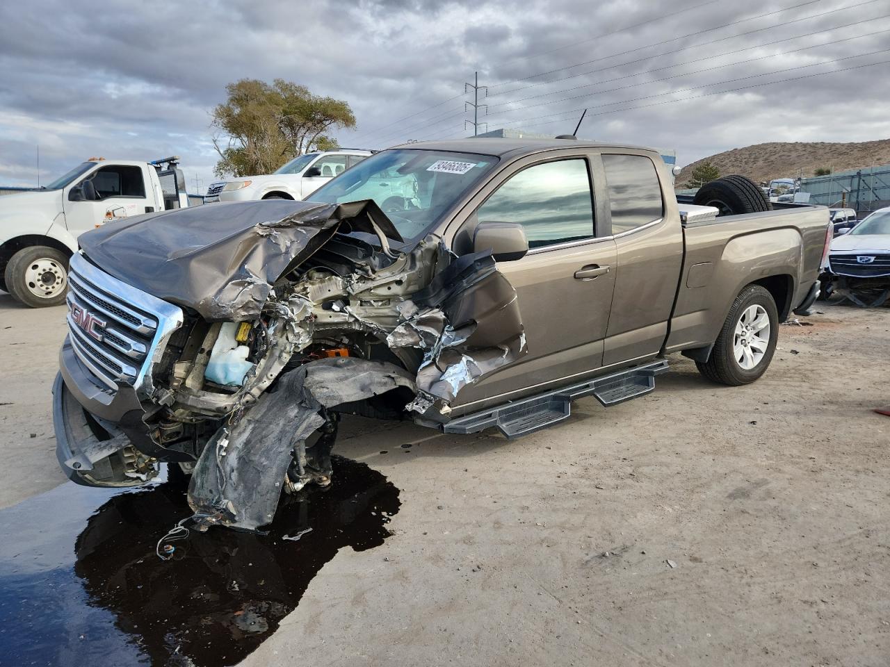 2015 GMC Canyon 4WD SLE, VIN 1GTH6BE39F1159084 — Front end