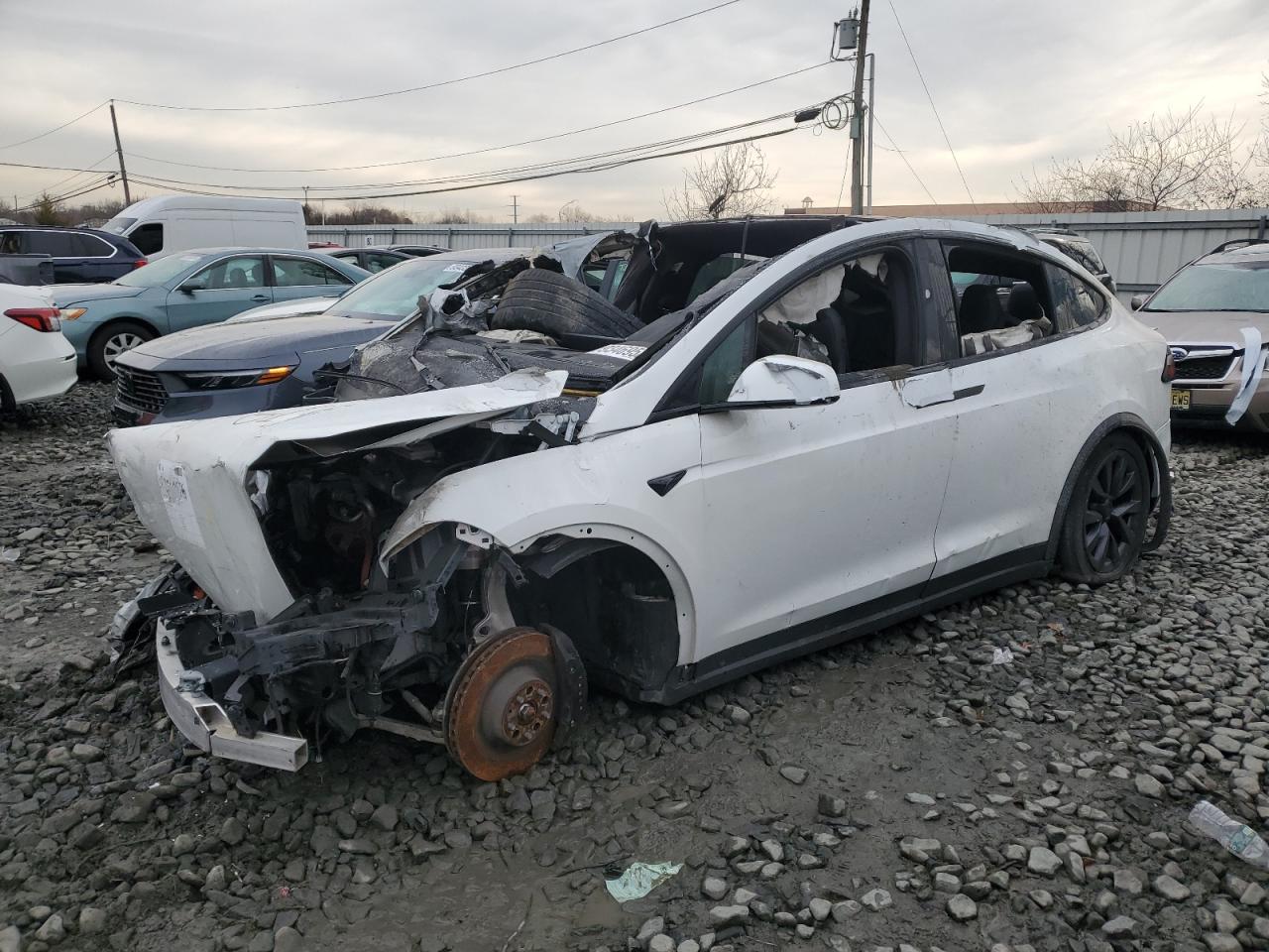 2023 Tesla Model X, VIN 7SAXCAE58PF385595 — Burn