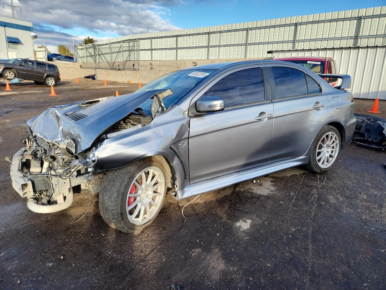 2015 Mitsubishi Lancer Evolution GSR, VIN JA32W8FV5FU024173 — Front end