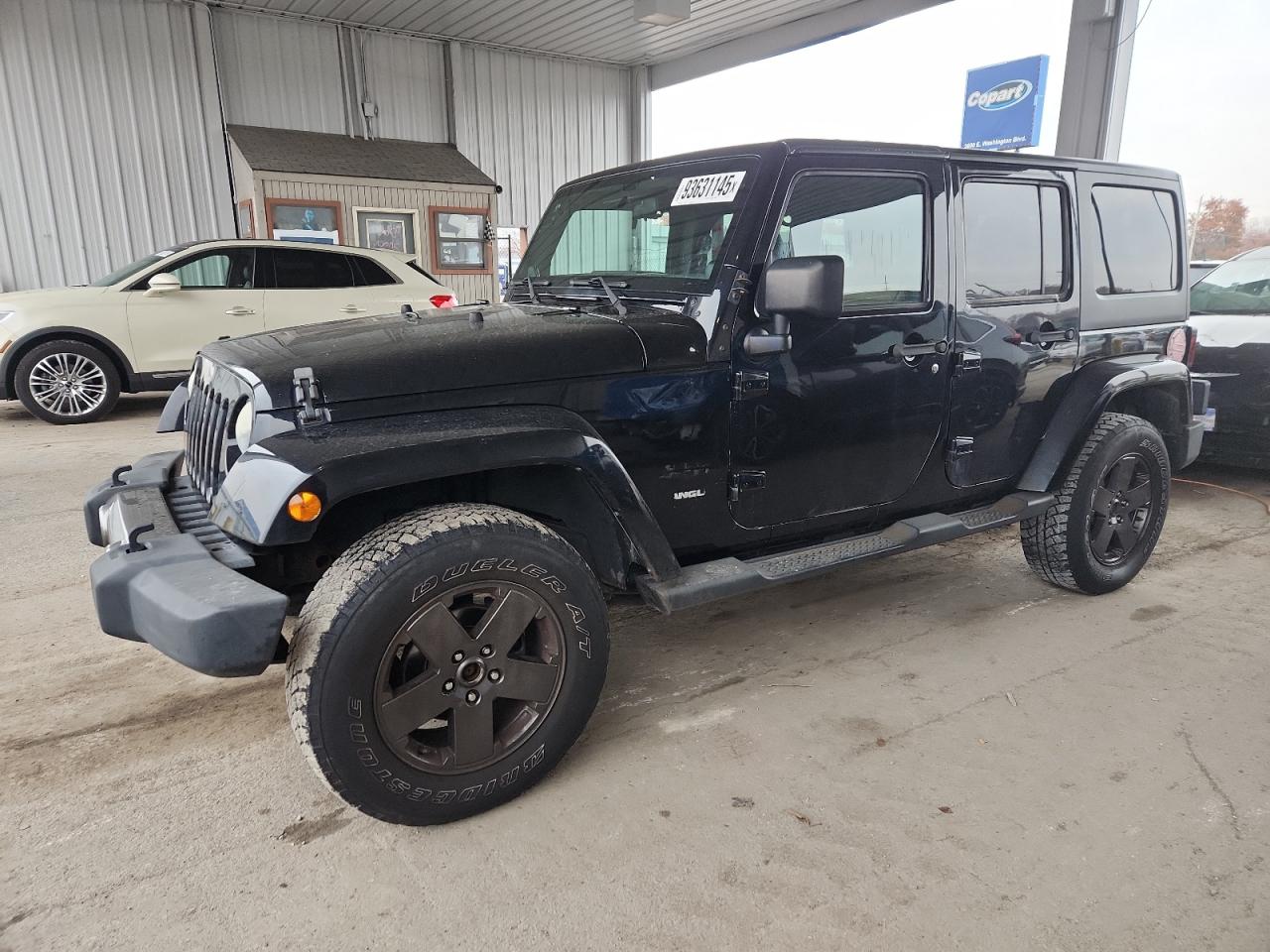 2011 Jeep Wrangler Unlimited Sahara, VIN 1J4HA5H17BL632676 — Missing or altered VIN