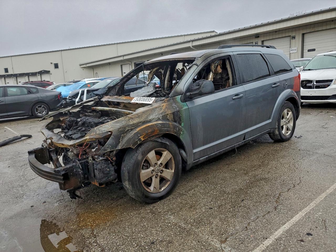 2009 Dodge Journey SXT, VIN 3D4GG57V79T201230 — Interior fire