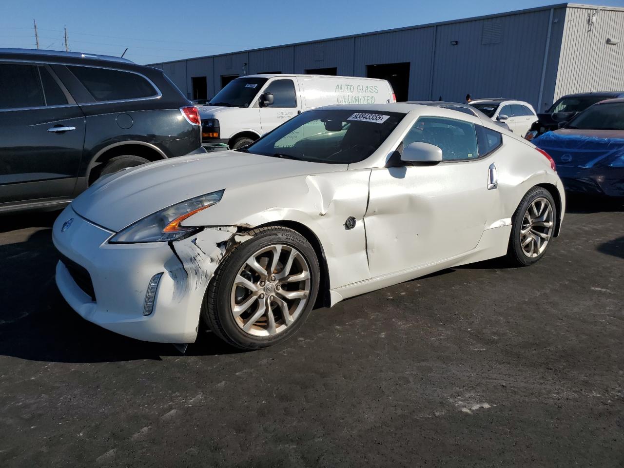 2013 Nissan 370Z, VIN JN1AZ4EH0DM382077 — Side