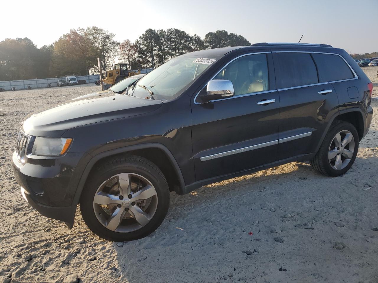 2013 Jeep Grand Cherokee Overland Summit, VIN 1C4RJECGXDC526344 — Фото с аукциона 1 of 13