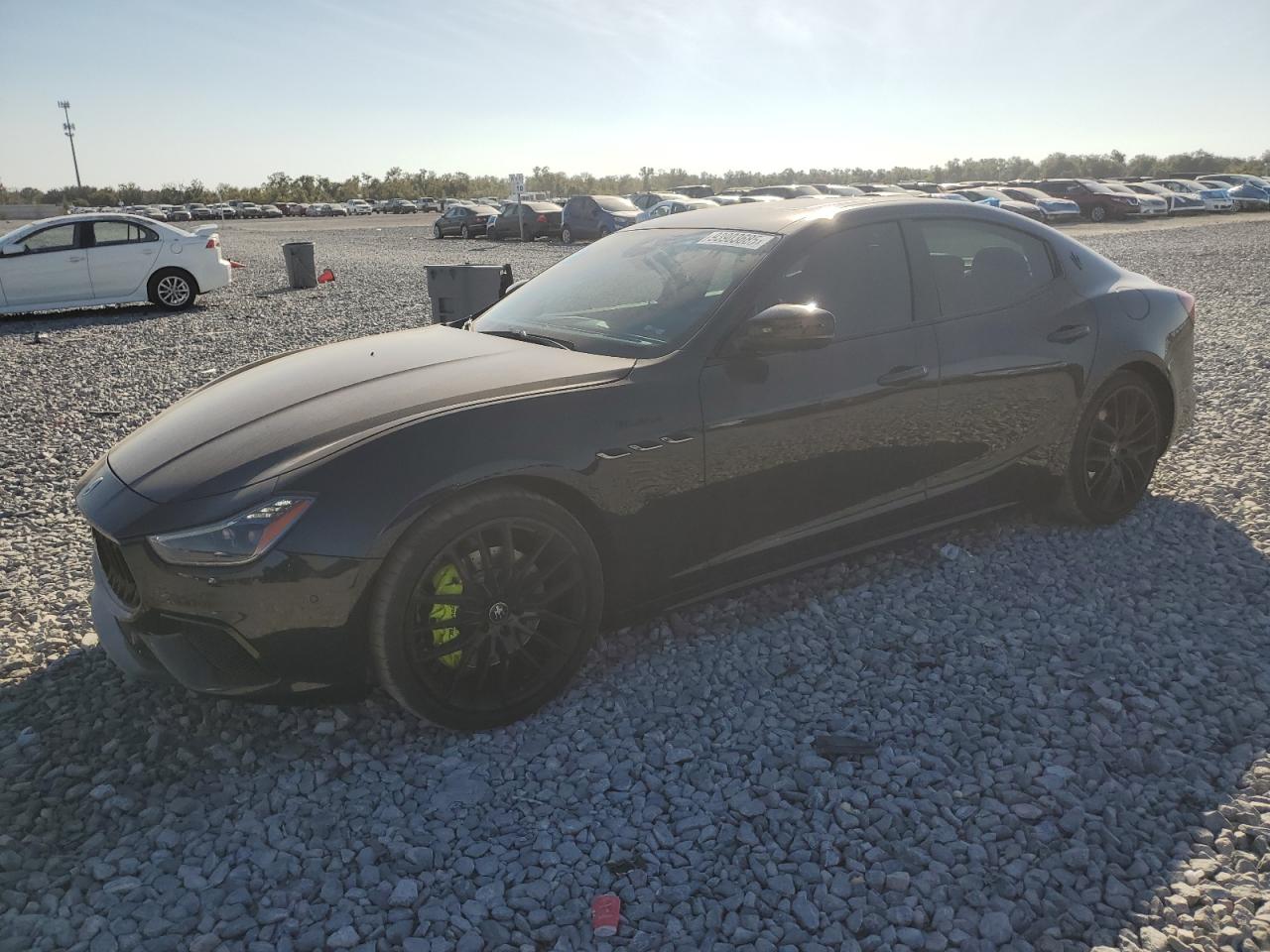 2023 Maserati Ghibli Modena, VIN ZAM57YSMXPX414075 — Side