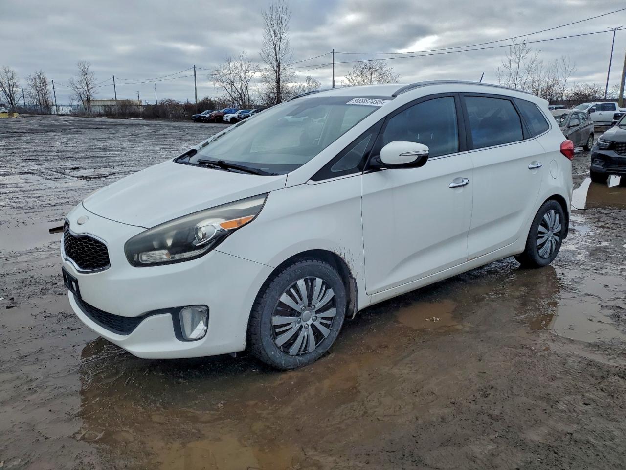 2014 Kia Rondo EX, VIN KNAHU8A36E7014706 — Side