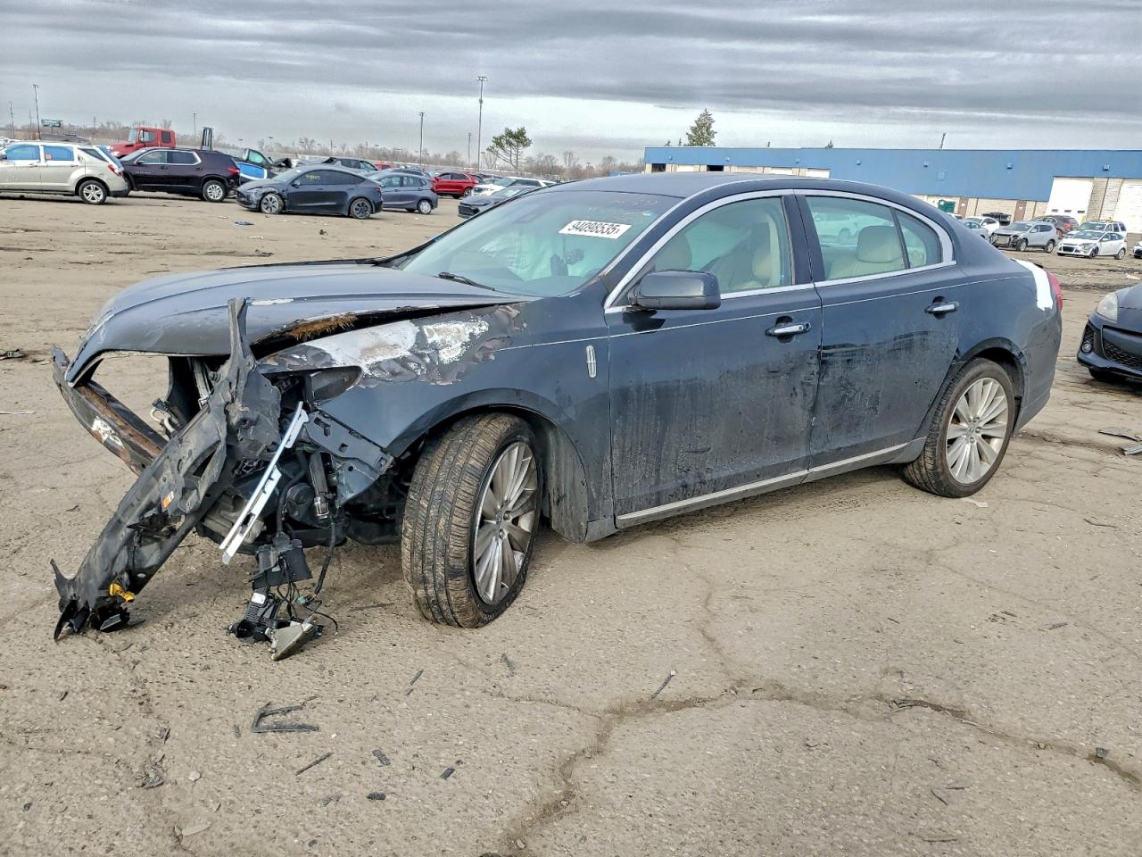 2014 Lincoln MKS EcoBoost, VIN 1LNHL9FT4EG611756 — Engine fire