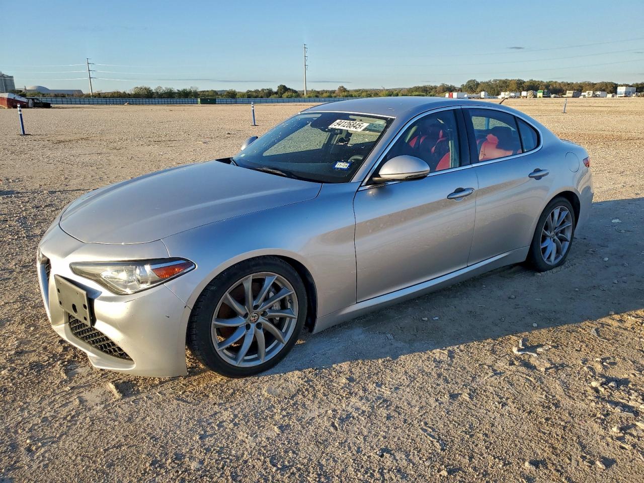 2019 Alfa Romeo Giulia Sport, VIN ZARFAMAN1K7597989 — Hail