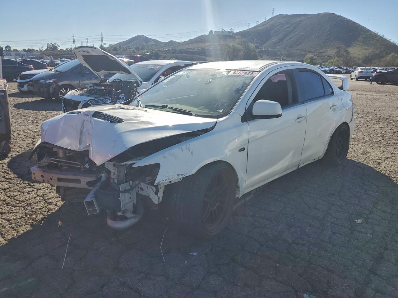 2014 Mitsubishi Lancer Evolution GSR, VIN JA32W8FV0EU018280 — Front end