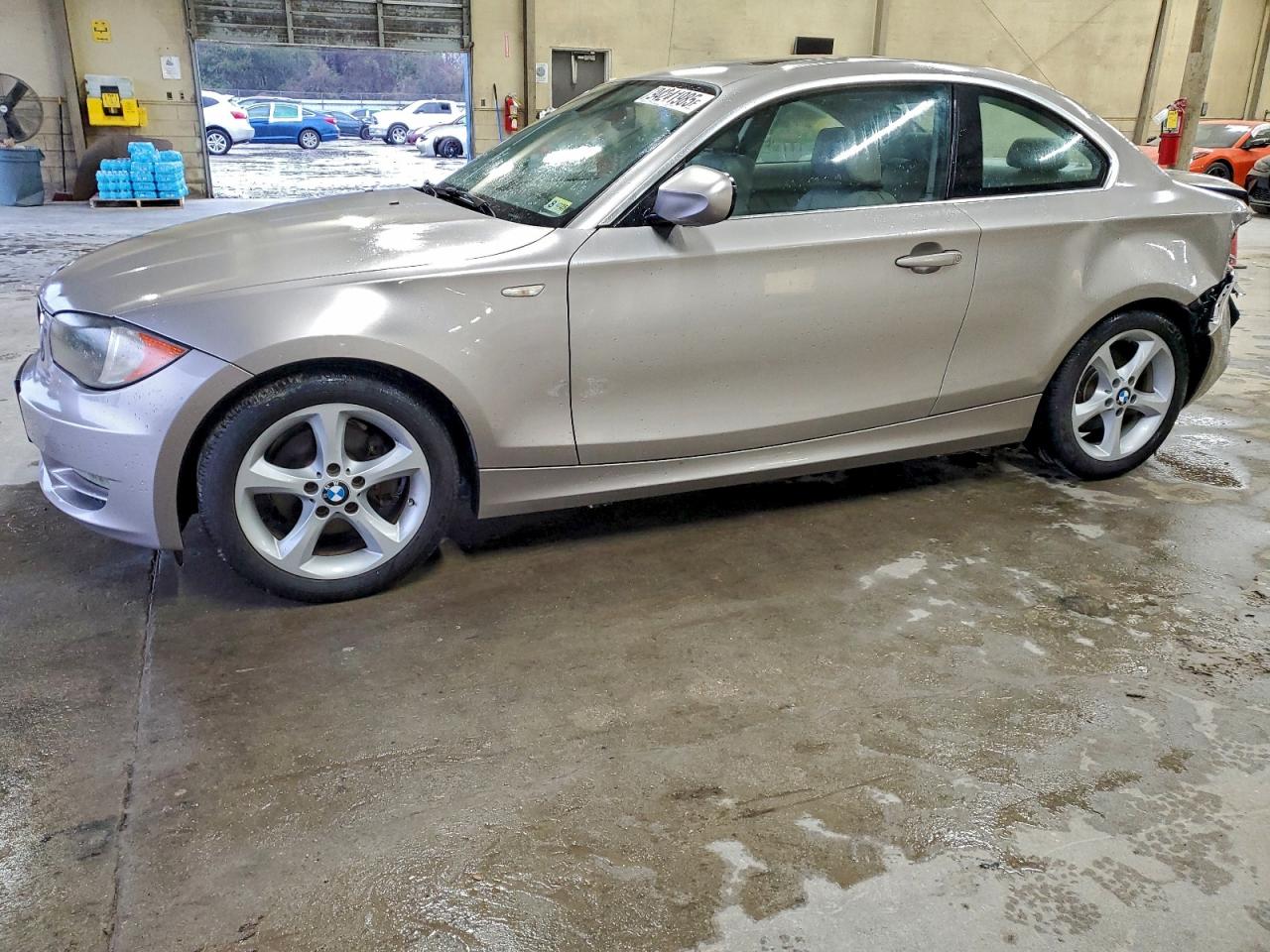 2011 BMW 1 Series 128i, VIN WBAUP7C52BVP21968 — Rear end