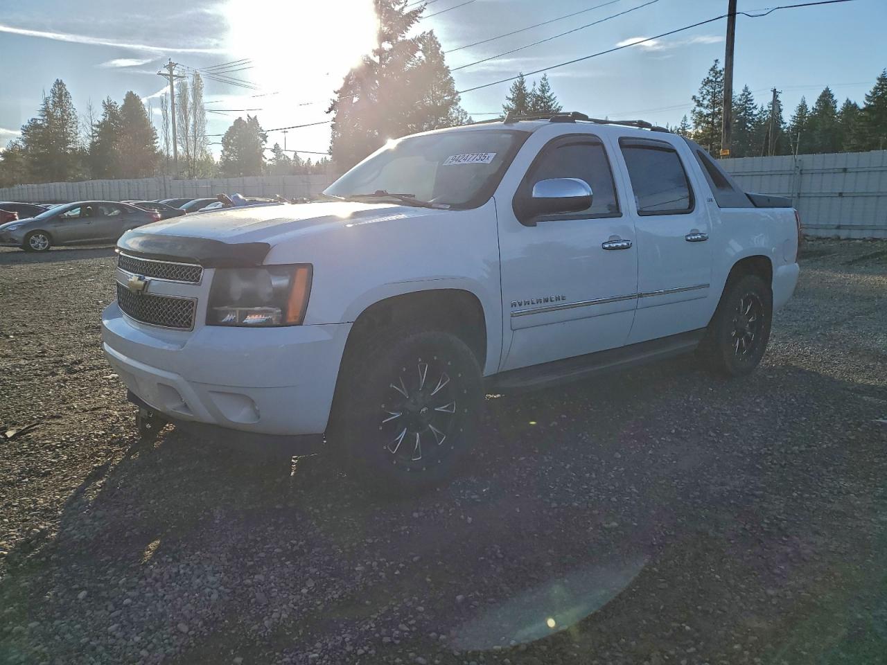2011 Chevrolet Avalanche LTZ, VIN 3GNTKGE30BG409012 — Front end