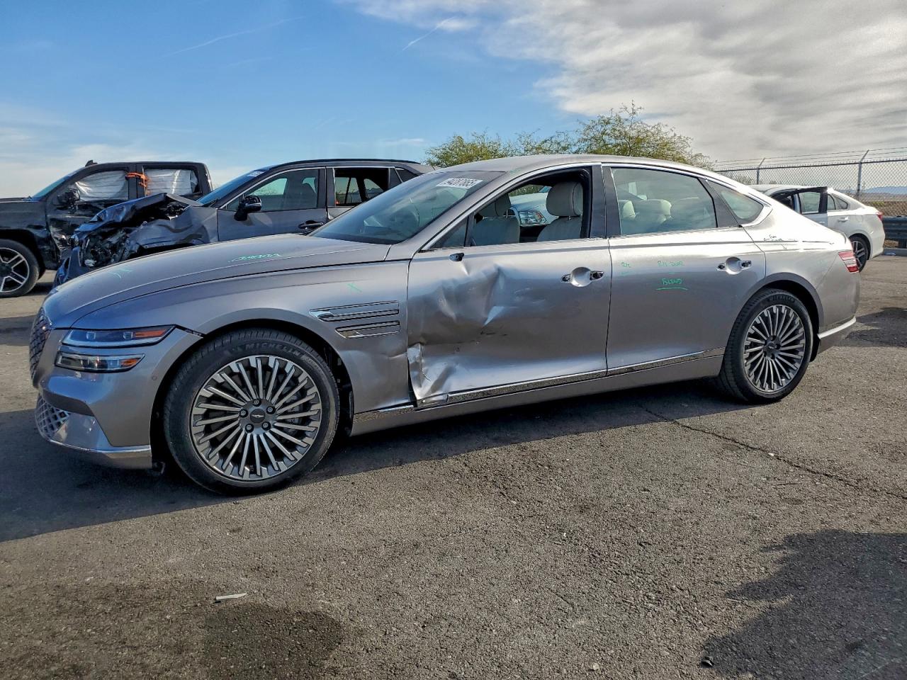 2023 Genesis G80, VIN KMTGE4S11PU004365 — Side