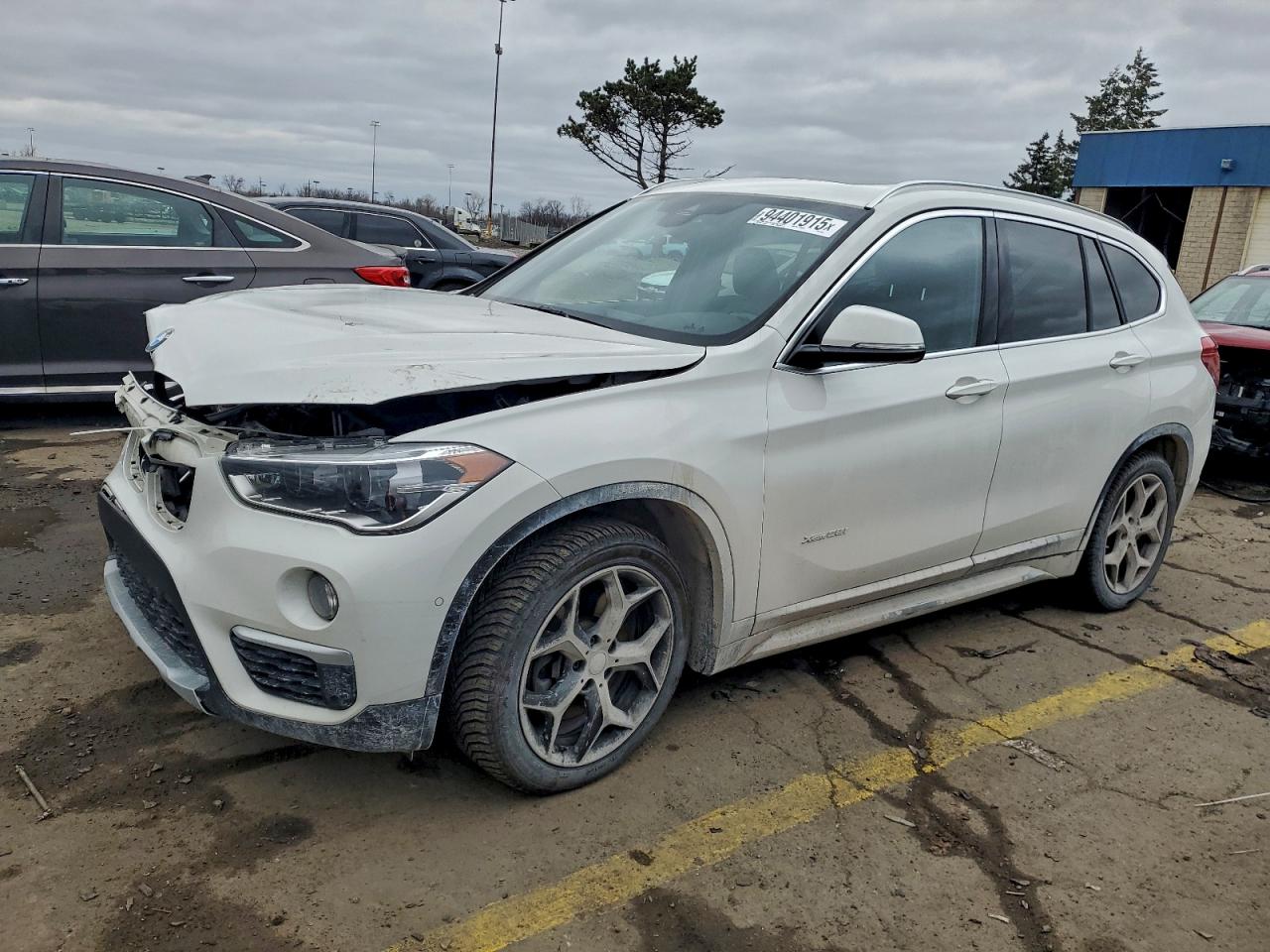 2018 BMW X1 xDrive28i, VIN WBXHT3C35J5K24261 — Front end