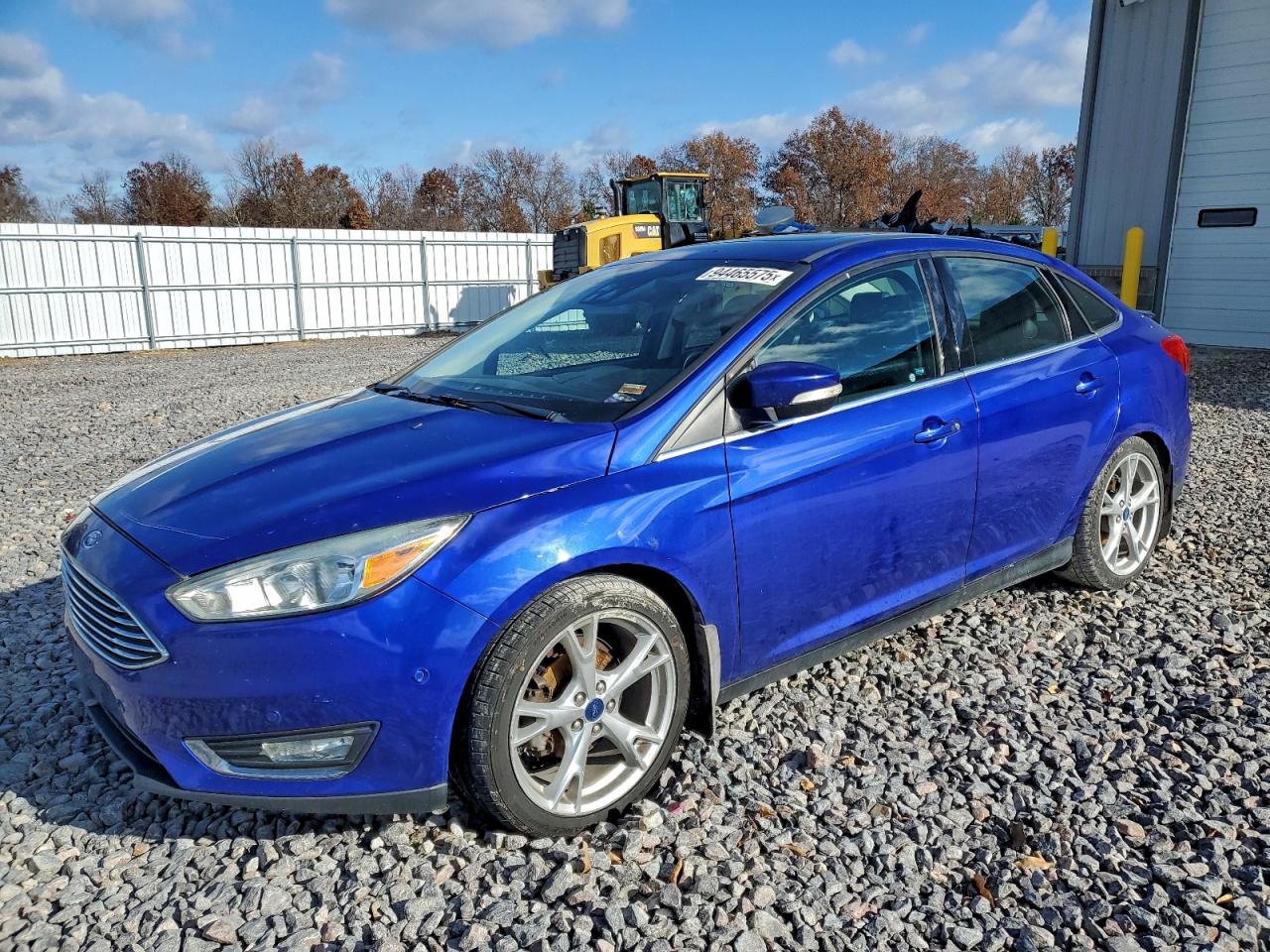 2015 Ford Focus Titanium, VIN 1FADP3J25FL256940 — Front end