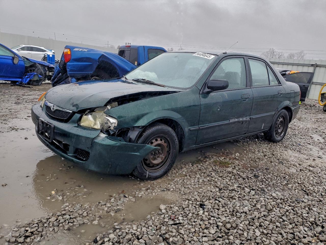 1999 Mazda Protege DX, VIN JM1BJ2220X0106460 — Перед