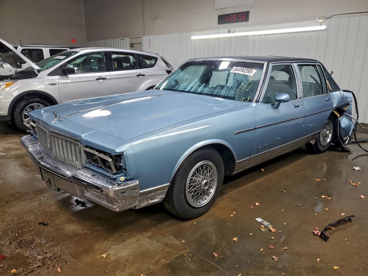 1986 Pontiac Parisienne, VIN 1G2BT69Y7GX274037 — Rear end